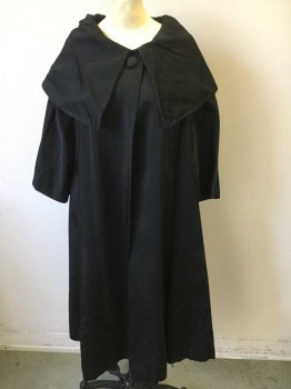 COLLEGIENNE, Black, Silk, Solid, 3/4 Sleeve, Wide Collar That Comes to a Point in Front (Rounded in Back), 1 Large Self Covered Button at Center Front Neck, White Satin Lining, 2 Welt Pockets at Sides, Flared Out Swing Coat Style, Late 1950's