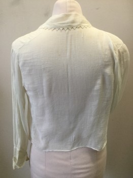 N/L, White, Cotton, Solid, Batiste with Lace Detail at Front Neck and Collar. Long Sleeves with Lace Trim Cuffs. Side Front Closure with Tiny Buttons at Left Front. Repair Work on Lace Front  Creating Slight Puckering.. Small Holes on Back,