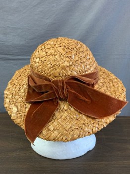 JOAN FRAZIER, Tan Brown, Chestnut Brown, Straw, Silk, Tan Straw, Chestnut Brown Velvet Band and Self Bow, Brim Wider In Front Than In Back, At Front It Is 4" Long