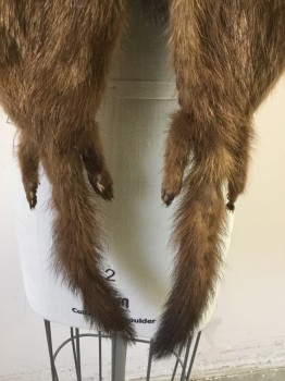 NL, Tan Brown, Fur, Solid, Mink Fur Caplet, 2 Heads at Center Front with Two Tails, Longer Back with Four Rear Ends with Tails.very Good Condition. Satin Facing with Novelty Trim