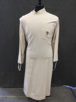 MTO, Cream, Cotton, Herringbone, Doctor's Gown/Jacket, Crossover Front, Mother of Pearl Shoulder Buttons and Side Buttons, Stand Collar, Long Sleeves, Embroidered Medical Caduceus on Pocket, Floor Length, Pleated at Back Waistband with Mother of Pearl Buttons, Side Vent Slits **Sleeves Shortened/Cuffs Removed
