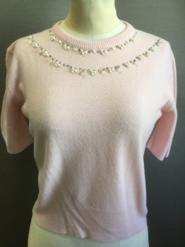 COLLEEN KNITWEAR, Baby Pink, Orlon Acrylic, Solid, Pullover, Short Sleeves, Knit, Pearls, Rhinestones, & Teardrop Beads Decorate the Neckline.