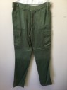 N/L MTO, Green, Synthetic, Solid, Cargo Pants: Bumpy Textured Synthetic, Zip Fly, 1/2" Wide Belt Loops, 6 Pockets Including 2 Cargo Pockets, Quilted/Reinforced Moto Panels at Knees, Slim Straight Leg, Made To Order